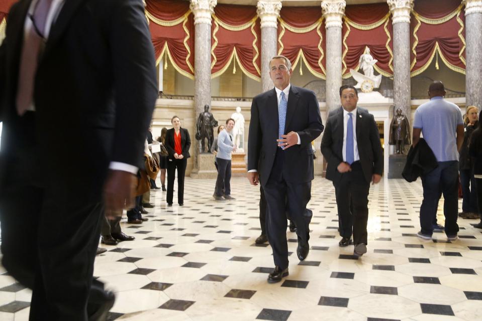 Boehner walks to the House floor for procedural votes for legislation to fund the Department of Homeland Security at the Capitol in Washington